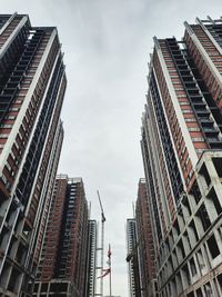 Low angle view of buildings against sky