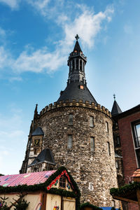 Low angle view of church against sky in town