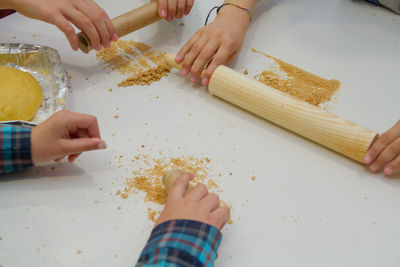 Midsection of woman preparing food on table