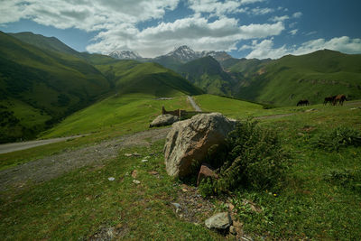 Scenic view of mountains against sky