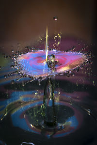 Close-up of drop splashing in water