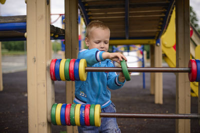 Boy playing in playground