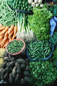 Fresh vegetables at the market. carrots, peas, leek, salad, okra, lady fingers, beetroot, yak fruits