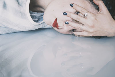 Close-up of woman lying down