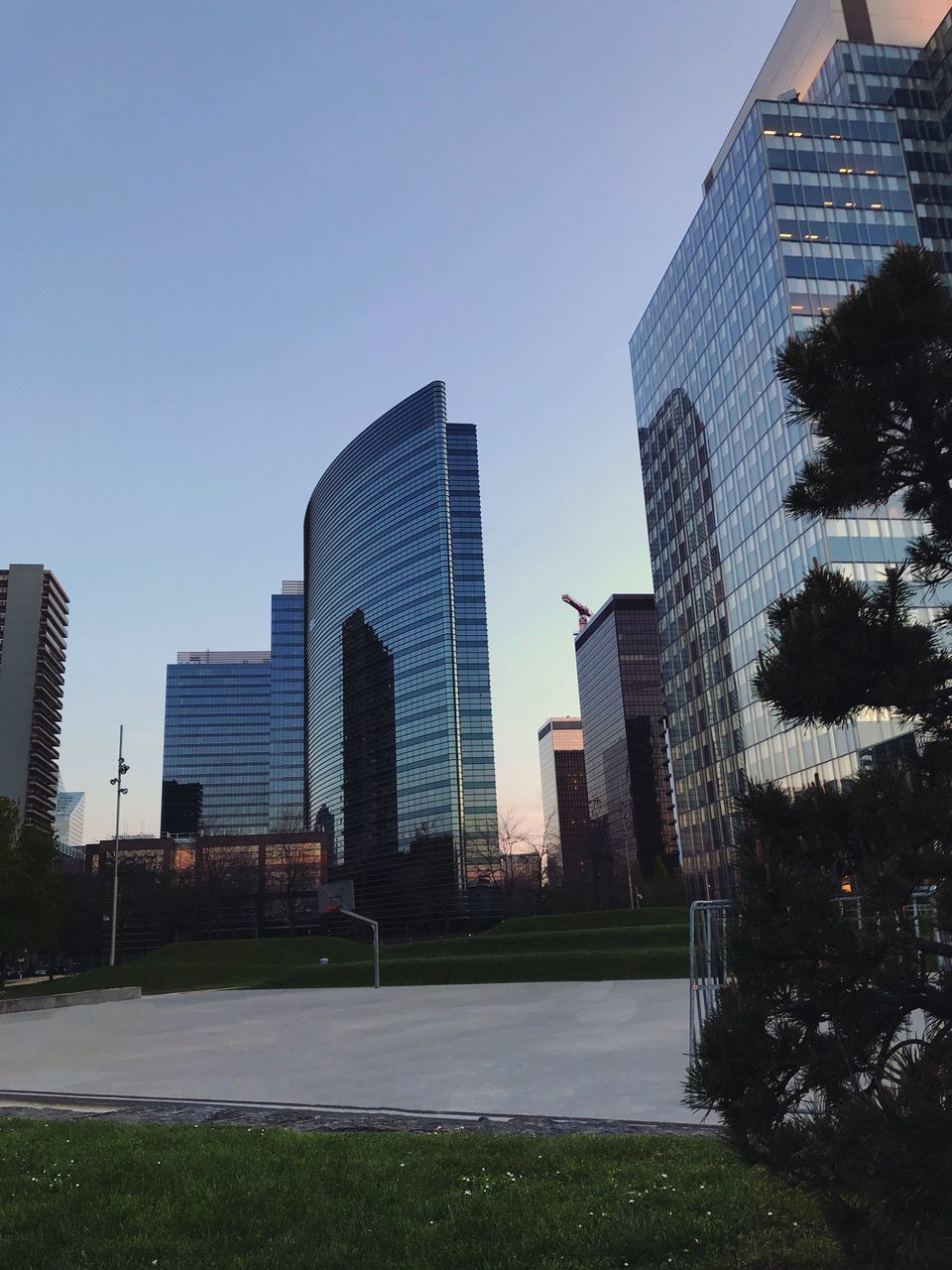 MODERN BUILDINGS AGAINST CLEAR SKY IN CITY