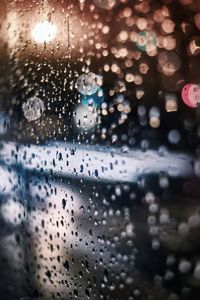 Close-up of wet car window