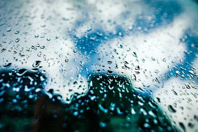 Full frame shot of wet glass window