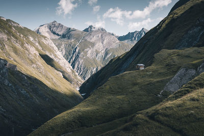 Scenic view of snowcapped mountains against sky