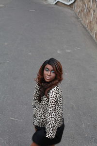 Young woman standing on street