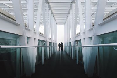 People walking on tiled floor