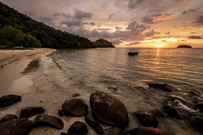 Scenic view of sea against sky during sunset