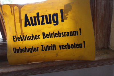 Close-up of yellow text