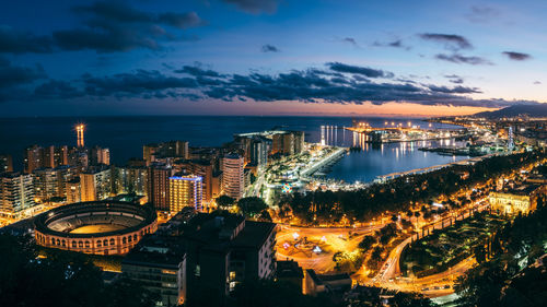 High angle view of cityscape against sky at night