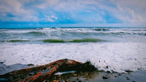 Scenic view of beach against sky