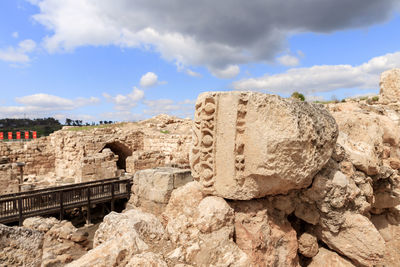 Old ruins of building against cloudy sky