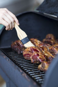 Close-up of meat on barbecue grill