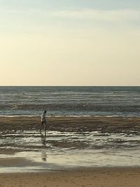 Scenic view of sea against sky during sunset