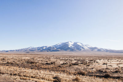 Scenic view of landscape and mountains against sky