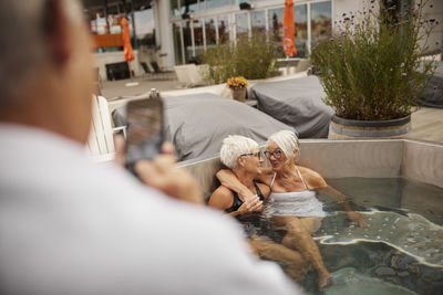 Senior women relaxing in hot tub