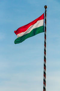 Low angle view of flag against sky