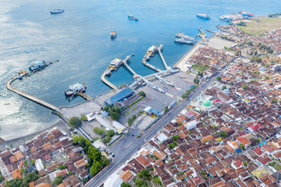 High angle view of cityscape by sea