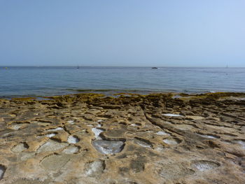 Scenic view of sea against clear sky