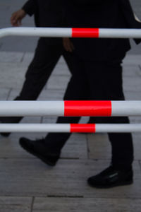 Low section of woman standing on floor