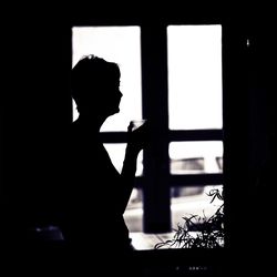 Close-up of woman in dark