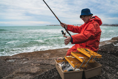 Man fishing on beach