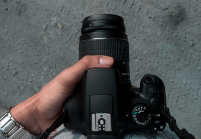 Man photographing camera