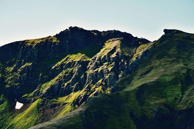 Low angle view of mountains against clear sky