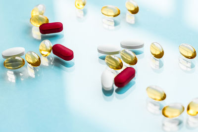 Close-up of pills on white background