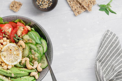 High angle view of salad in bowl on table