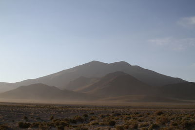 Scenic view of desert against clear sky