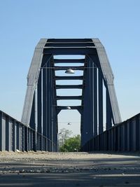 Low angle view of bridge against clear sky