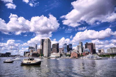 Buildings in city against sky