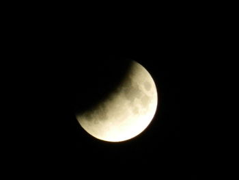 Low angle view of moon against sky at night