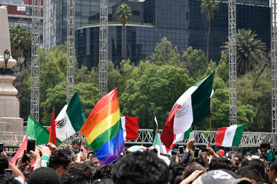 Group of people in front of buildings