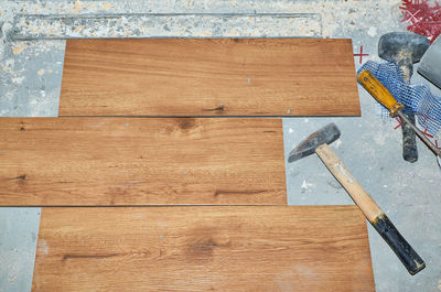 High angle view of wooden planks on hardwood floor