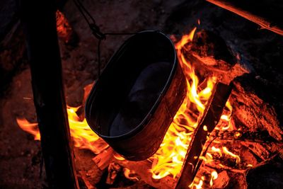 Close-up of fire burning at night