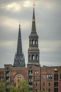 Low angle view of buildings against sky