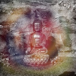 Digital composite image of buddha statue