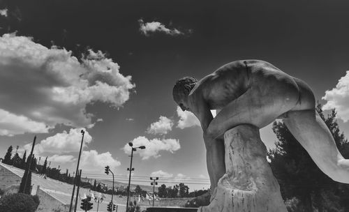 Low angle view of statue against sky