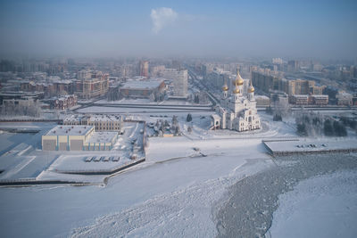 High angle view of city at waterfront