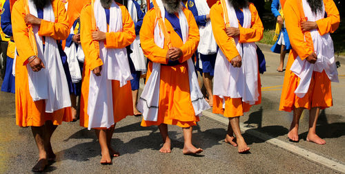 Group of people standing on street