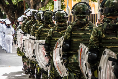 Soldiers of the brazilian army are standing in line, waiting for the independence parade