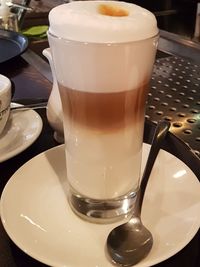 Close-up of coffee cup on table