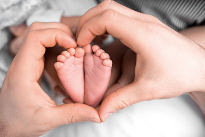 Close-up of man holding hands