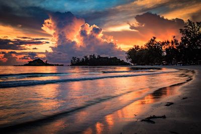 Scenic view of sea against sky at sunset