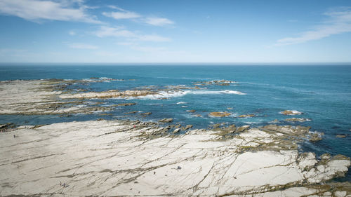 Rocks fading into ocean, coastal landscape shot made at kaikoura peninsula, new zealand